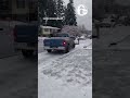 Icy conditions: Truck slides down street in Oregon, knocking out a mailbox image