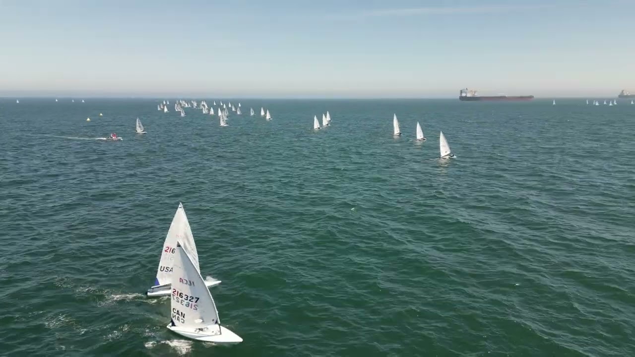 2023 Olympic Classes Regatta   Race 1   ILCA 6 first beat aerial
