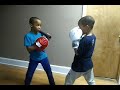 Twins teaching each other how to box  -  985095