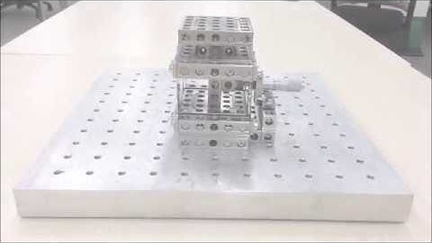 Compensating leaf-spring flexures for linear motion control – Folded Compound Linear Translator
