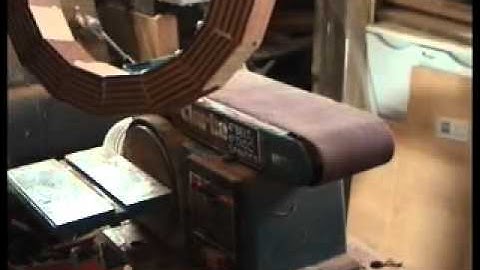 Sanding a segmented ring on a belt sander