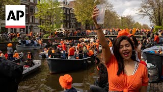 Watch Amsterdam turn orange on King's Day Resimi