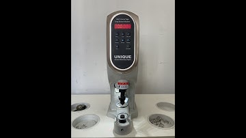 Snap button attaching machine with servo motor and safety protection device