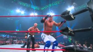 aj styles moonsault + daniels dropkick