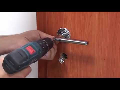 Video: Ce este un fus pe mânerul ușii?