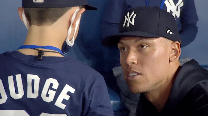Touching moment as young New York Yankees fan meet...
