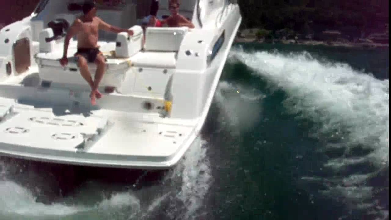 wakesurfing behind a SeaRay YouTube