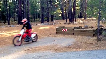 Dirt bike jumping off loading dock