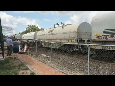 Southbound NS mixed freight train hammering the diamonds