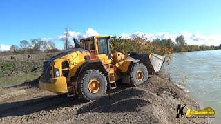 Volvo L180H Wheel Loader Loading Iveco Trucks