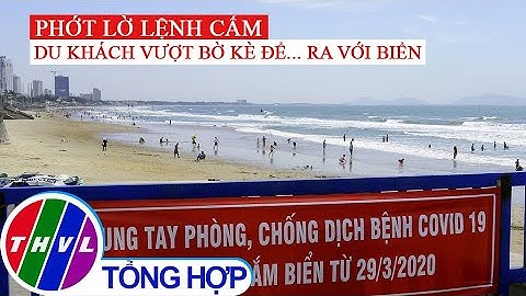 Du khách vượt bờ kè ào xuống biển Vũng Tàu, bất chấp lệnh cấm
