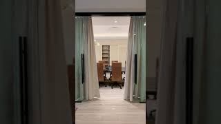 motorized ripple fold drapes in office as conference room seperation 2