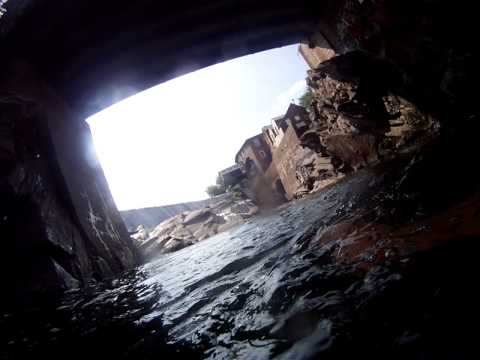 Grandpa and grandson's buddy jumping off 60 foot Covered bridge with his GoPro in hand.