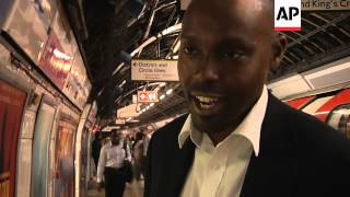 Station announcer who puts a smile on the faces of Olympic commuters
