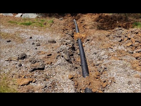 Installing culvert pipe in existing gravel driveway Bobcat e42 r series
