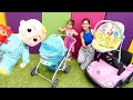 Ayşe, Defne ile Oyuncak Bebek JJ için yeni anakucağı alıyor. Bebek bakma oyunları