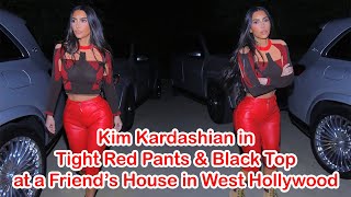 Kim Kardashian in Tight Red Pants & Black Top at a Friend’s House in West Hollywood