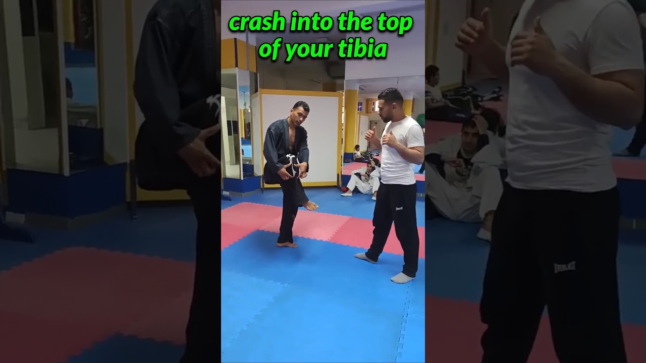Stop a low kick like a pro! 🥋💥 