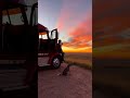 Trucker and Dog Watch Epic Sunset
