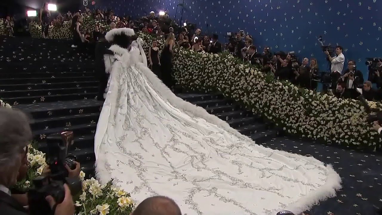 Diana Ross wears gown with 18-foot train embroidered with family names