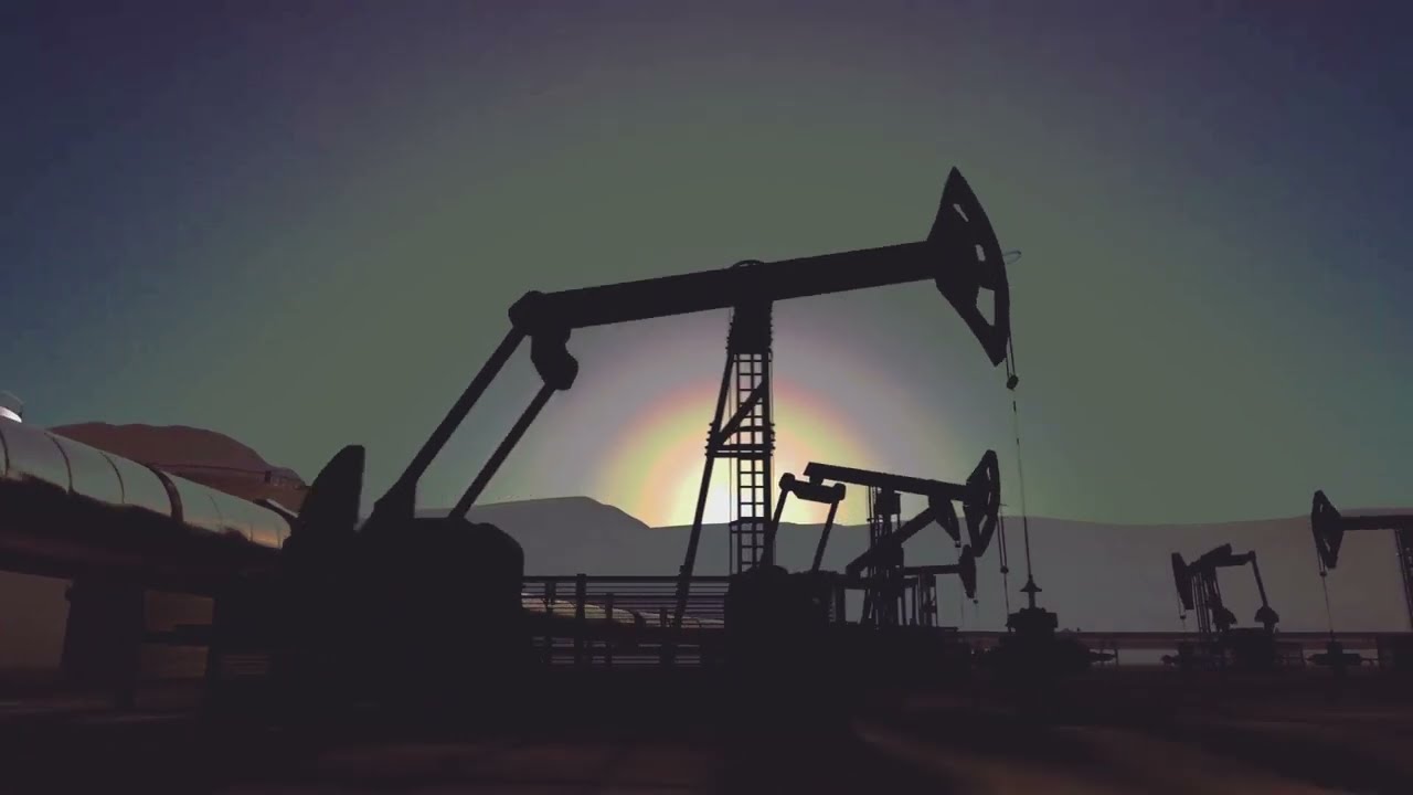 Aerial video footage of onshore oil extraction and oil industry facilities against the background of