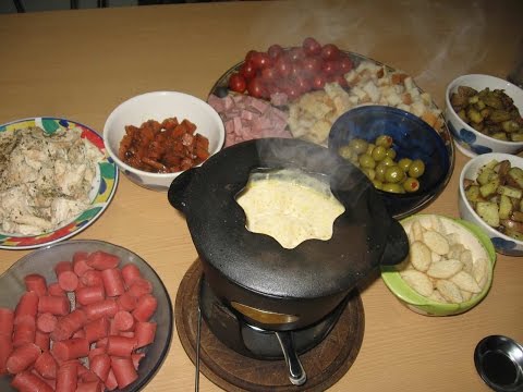 Fondue de queso con diversos acompañamientos