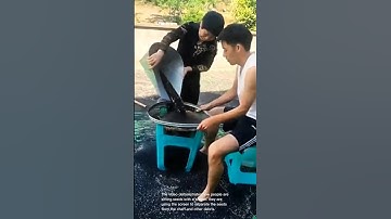 Sifting seeds with a screen: traditional farming methods