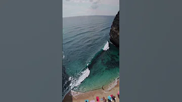 Massive Waves Crash Onto A Crowded Beach 