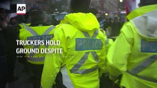 Truckers hold ground despite crackdown threat