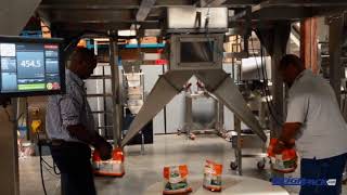 PrimoCombi® multihead weigher dispensing mini cucumbers dual discharge