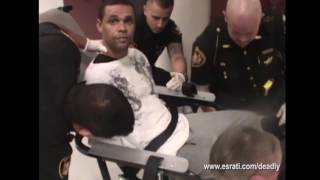 Officers pepper spray detainee in restraints