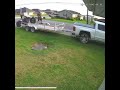 Guy on canam atv bends tailgate after bad trailer loading