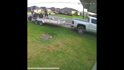 Guy on Can-Am atv bends tailgate after bad trailer loading