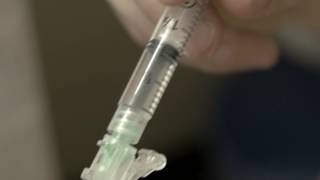 Transgender woman injects synthetic estrogen