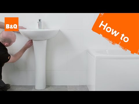 Wideo: Umywalka z postumentem do łazienki: instalacja zrób to sam