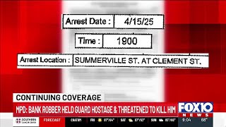 MPD: Bank robber held security guard hostage, threatened to kill him