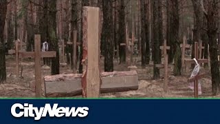 Ukraine: signs of torture at mass burial site News