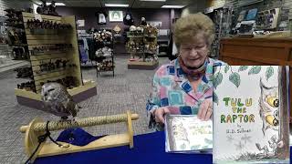 Lolly reads to Tootsie (Northern Saw-whet Owl)