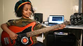 8 year old playing 'Is this Love' by Bob Marley