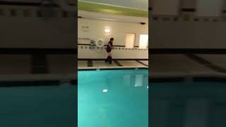 Kid Looses His Pants At A Pool