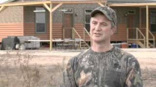 Ron Powell of Palm Harbor homes discuss the Palm Harbor Hunters Cabin