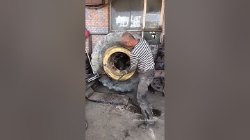 Removing loader wheel lock ring.