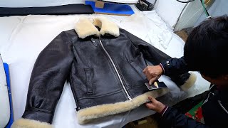 The process of making a shearling jacket from sheepskin. Korean shearling jacket factory