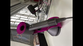 Dyson dryer display stand