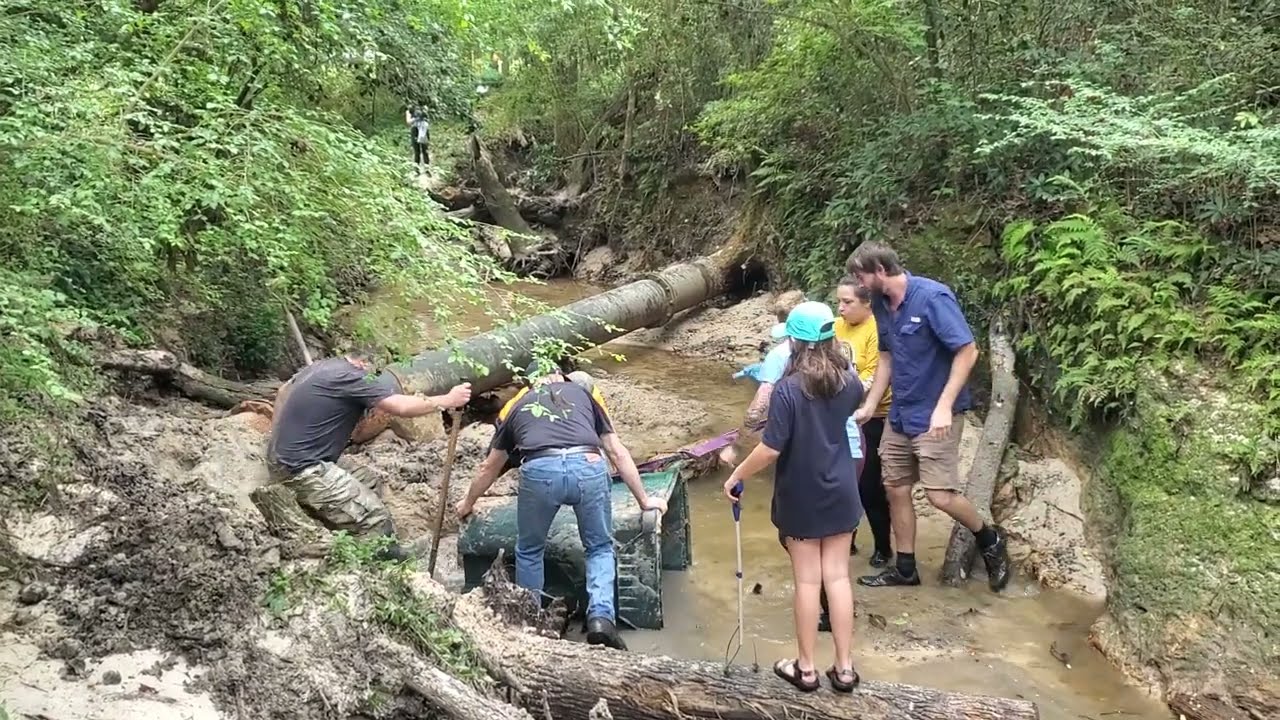Six heave the trash bin out, Two Mile Branch Cleanup 2022-04-16