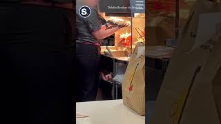 McDonald&#39;s Worker Dries Mop at French Fry Stand