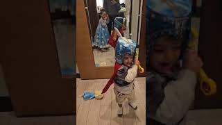 Mom records kids in their costumes in mirror then boy accidentally hits girl on face with sword