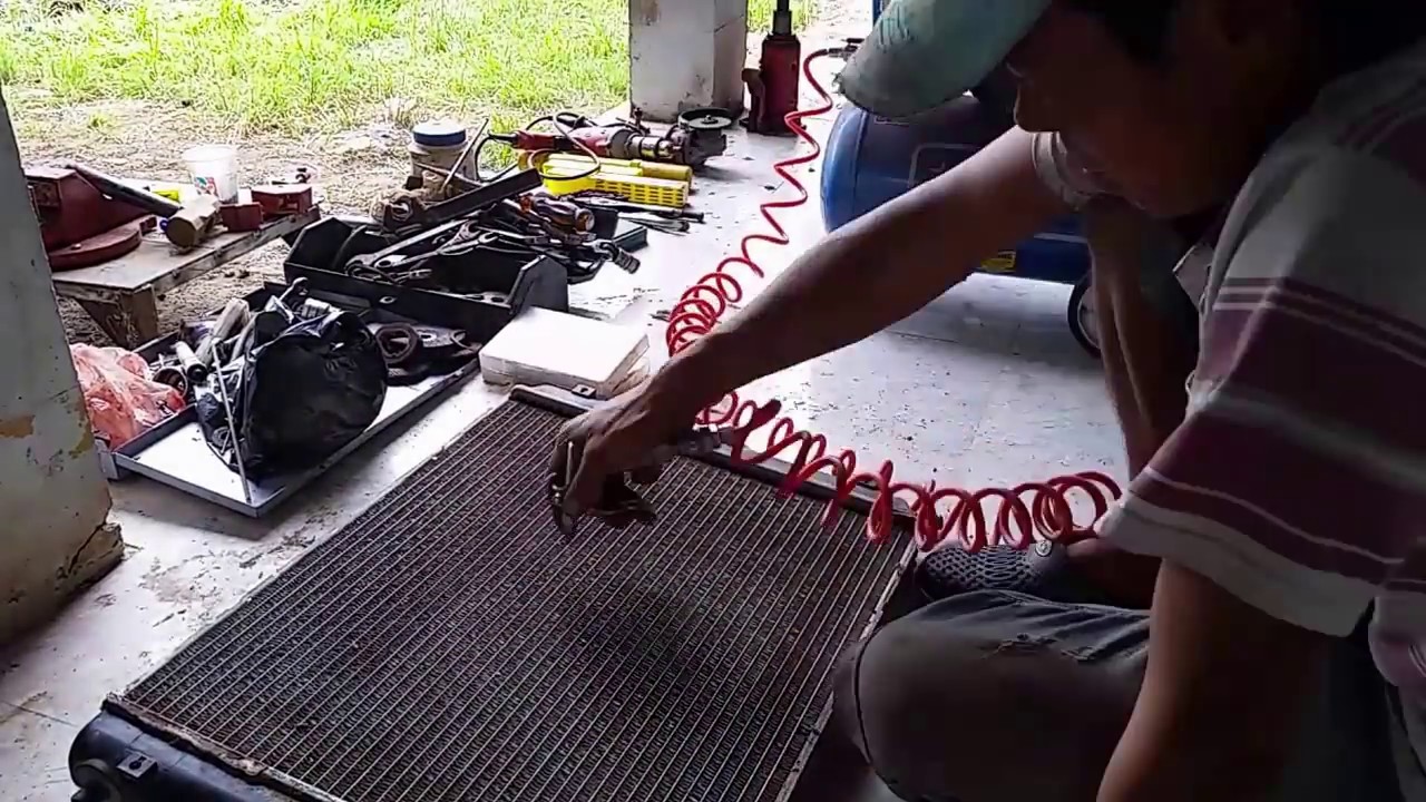 vệ sinh két nước xe tải 