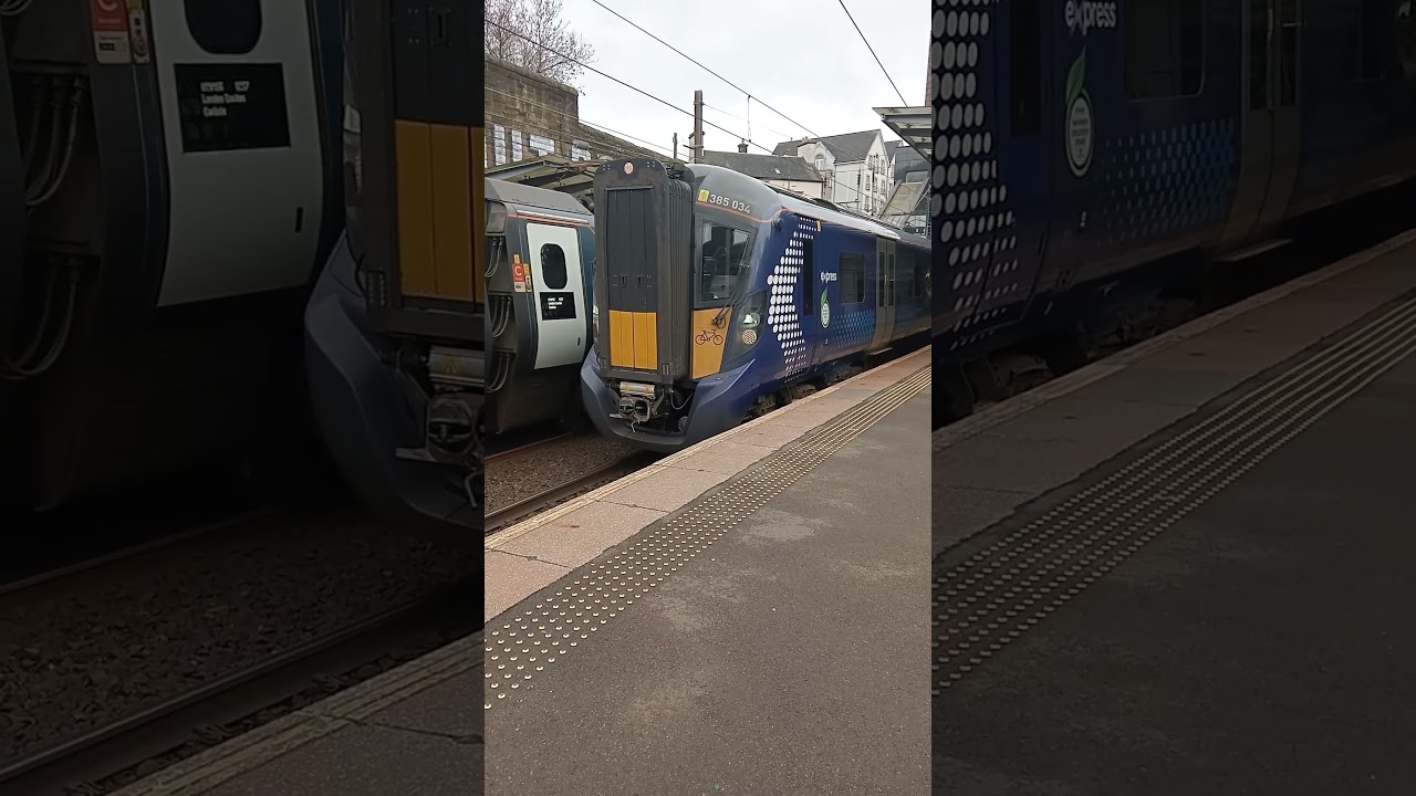 SCOTRAIL.385034@025 ARRIVING AT HAYMARKET.17 2 24.NEIL HAYTON RAILWAY MEMORIES.  
