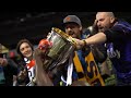 Sounders players celebrate on the pitch after winning CCL